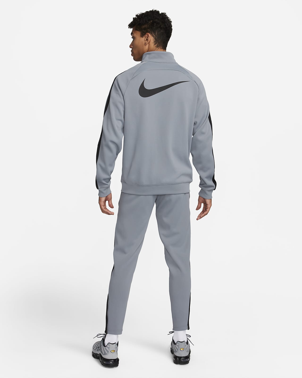 Nike Culture of Football Men's Dri-FIT Soccer Tracksuit.