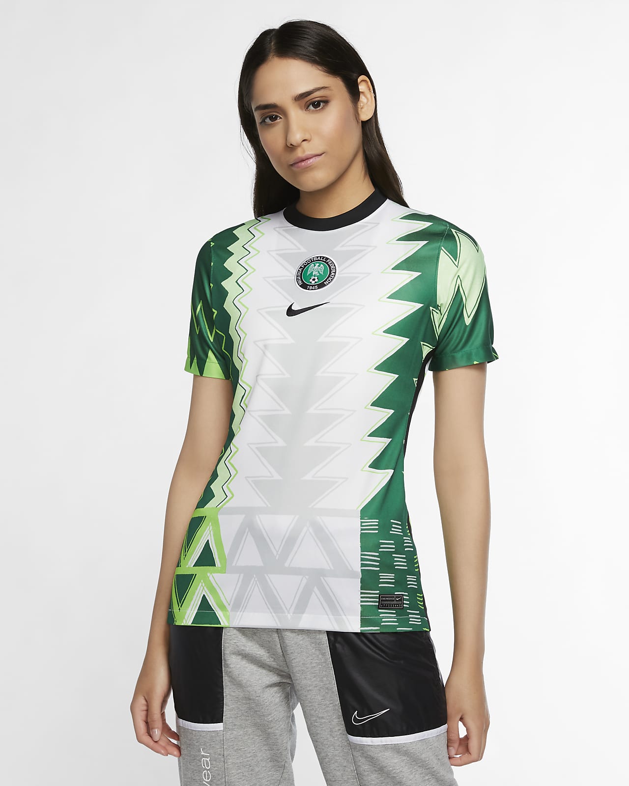 Camiseta de fútbol de local para mujer Stadium de Nigeria 2020. Nike.com