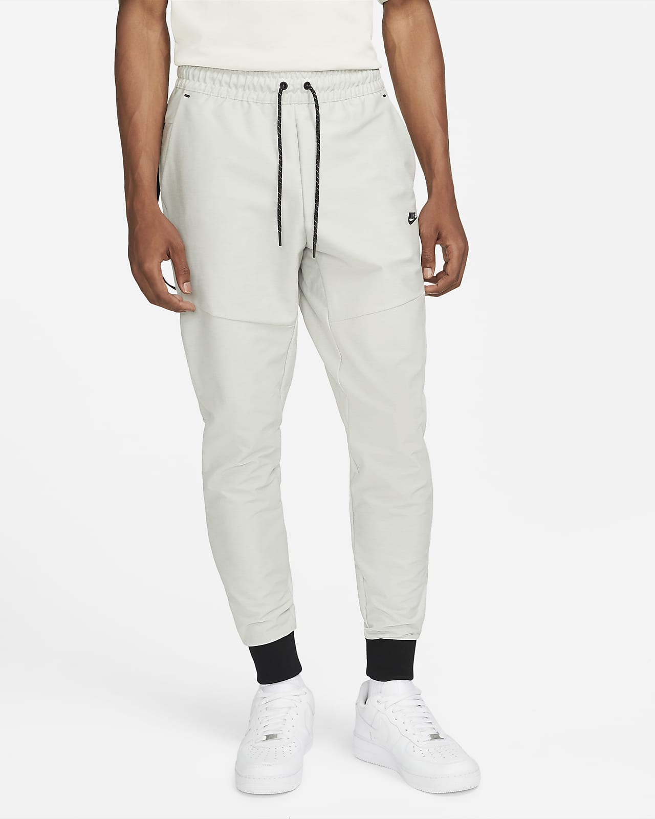 Nike Sportswear Dri-FIT Tech Pack Niet-gevoerde trainingsbroek voor heren.  Nike NL