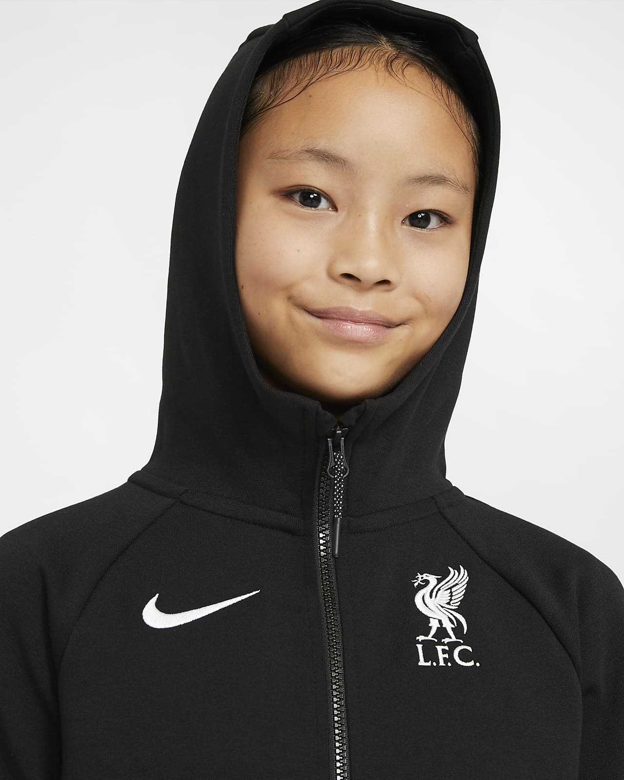 Liverpool F.C. Tech Fleece Essentials Older Kids' Full-Zip Hoodie. Nike EG