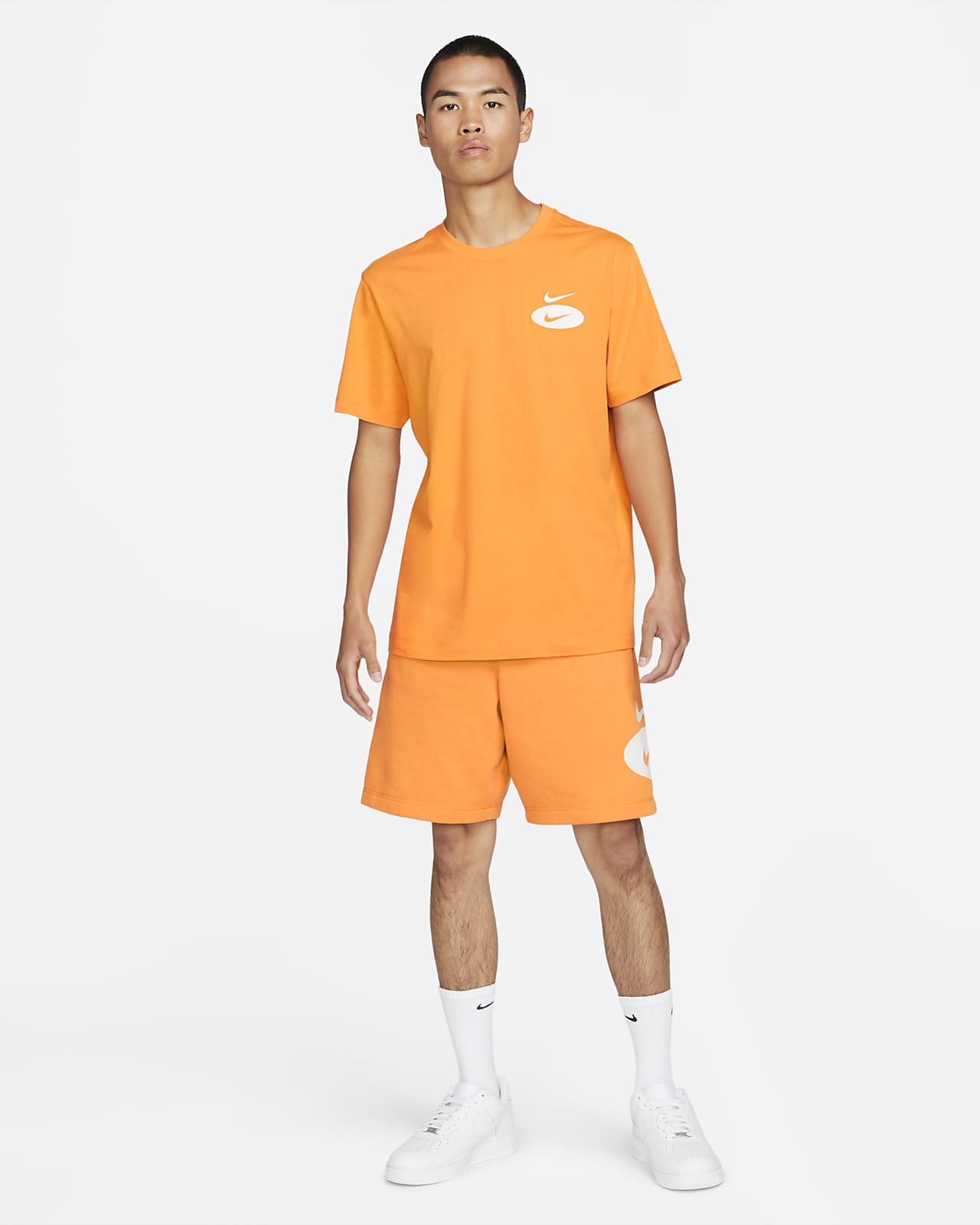 orange nike swoosh shorts