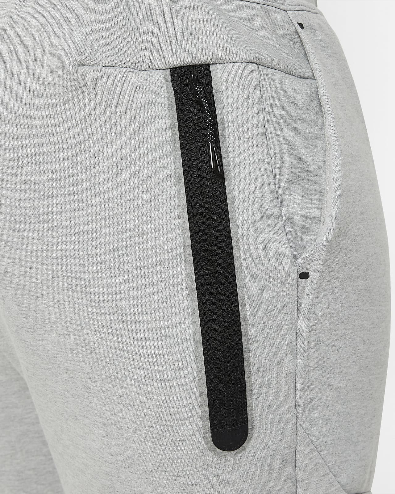grey and black nike tech fleece
