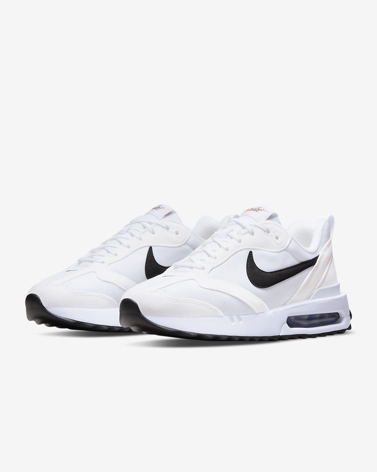 white nike air max trainers with black tick