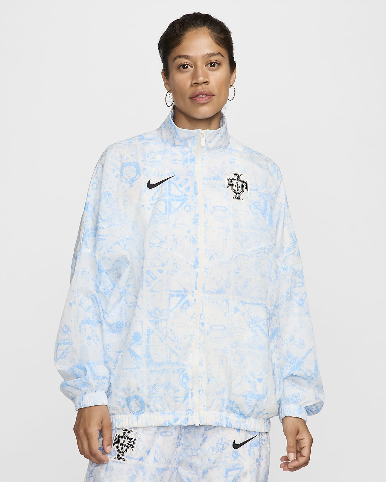 Giacca da calcio in tessuto Nike Portogallo Essential Windrunner – Donna