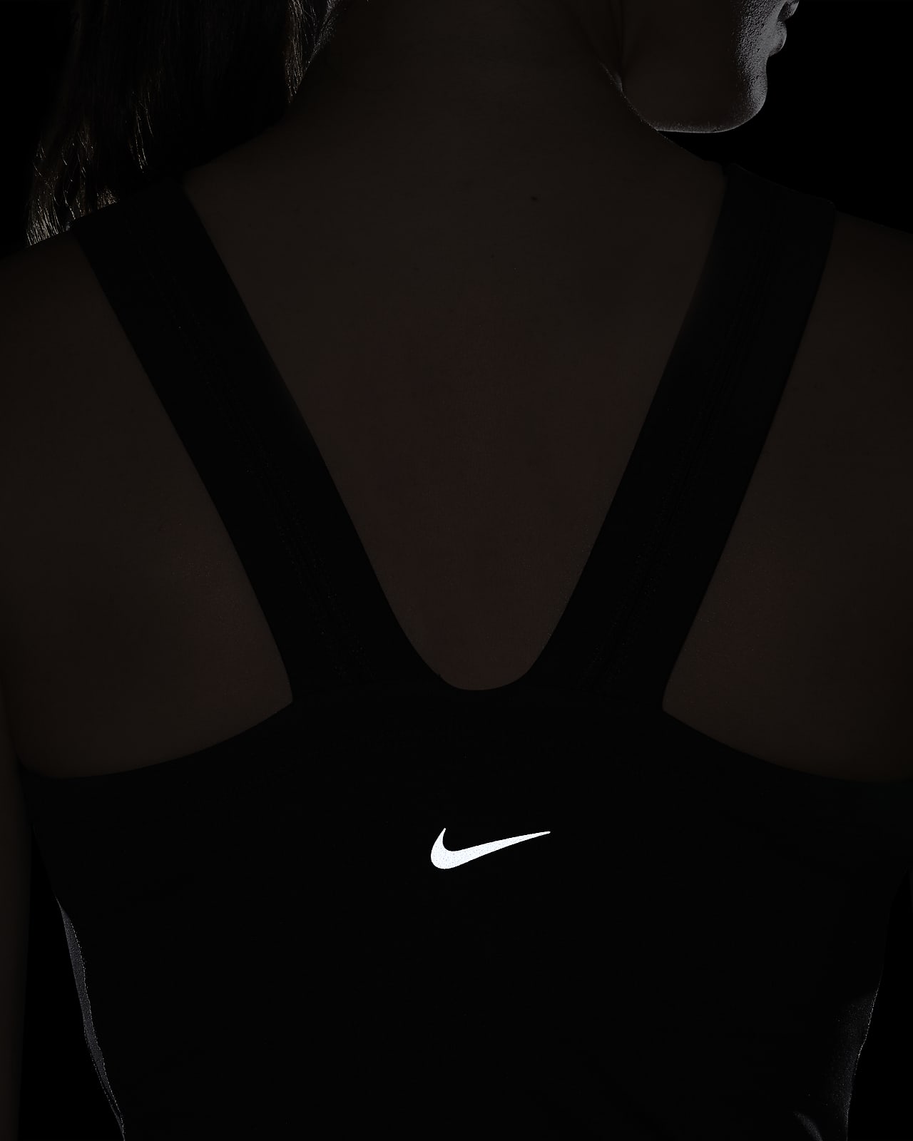 Nike's Strappy Crop Top in Black and White