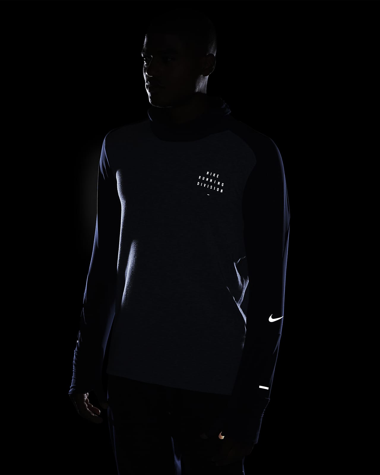 nike sphere run division top