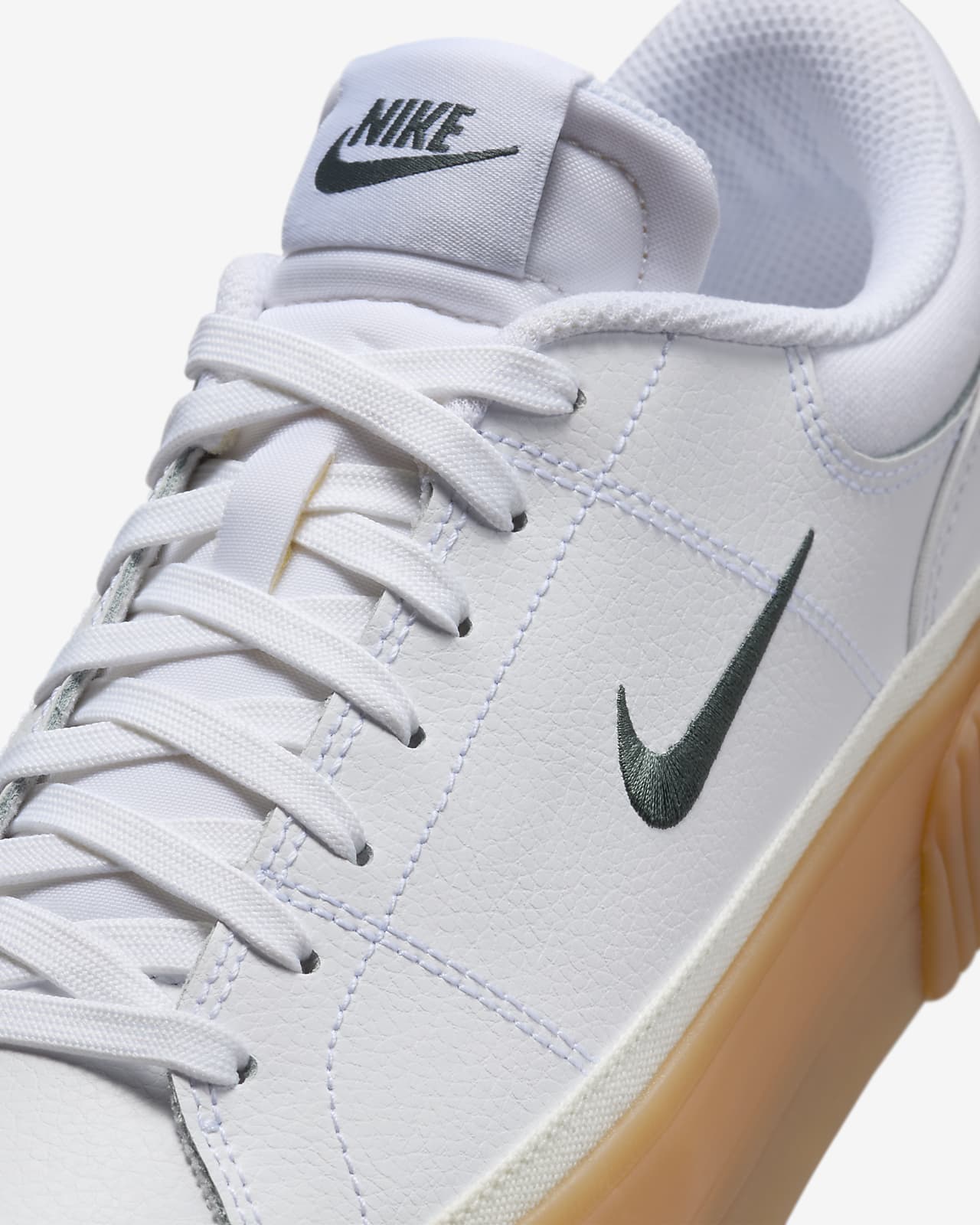 white nike shoes with gum soles