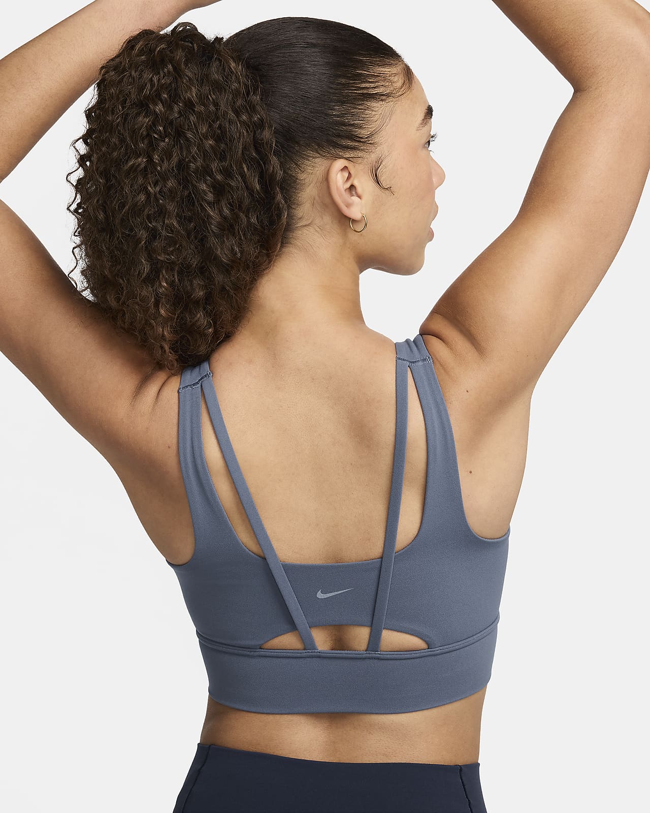 Prodloužená dámská sportovní podprsenka Nike Zenvy s vycpávkami a střední oporou