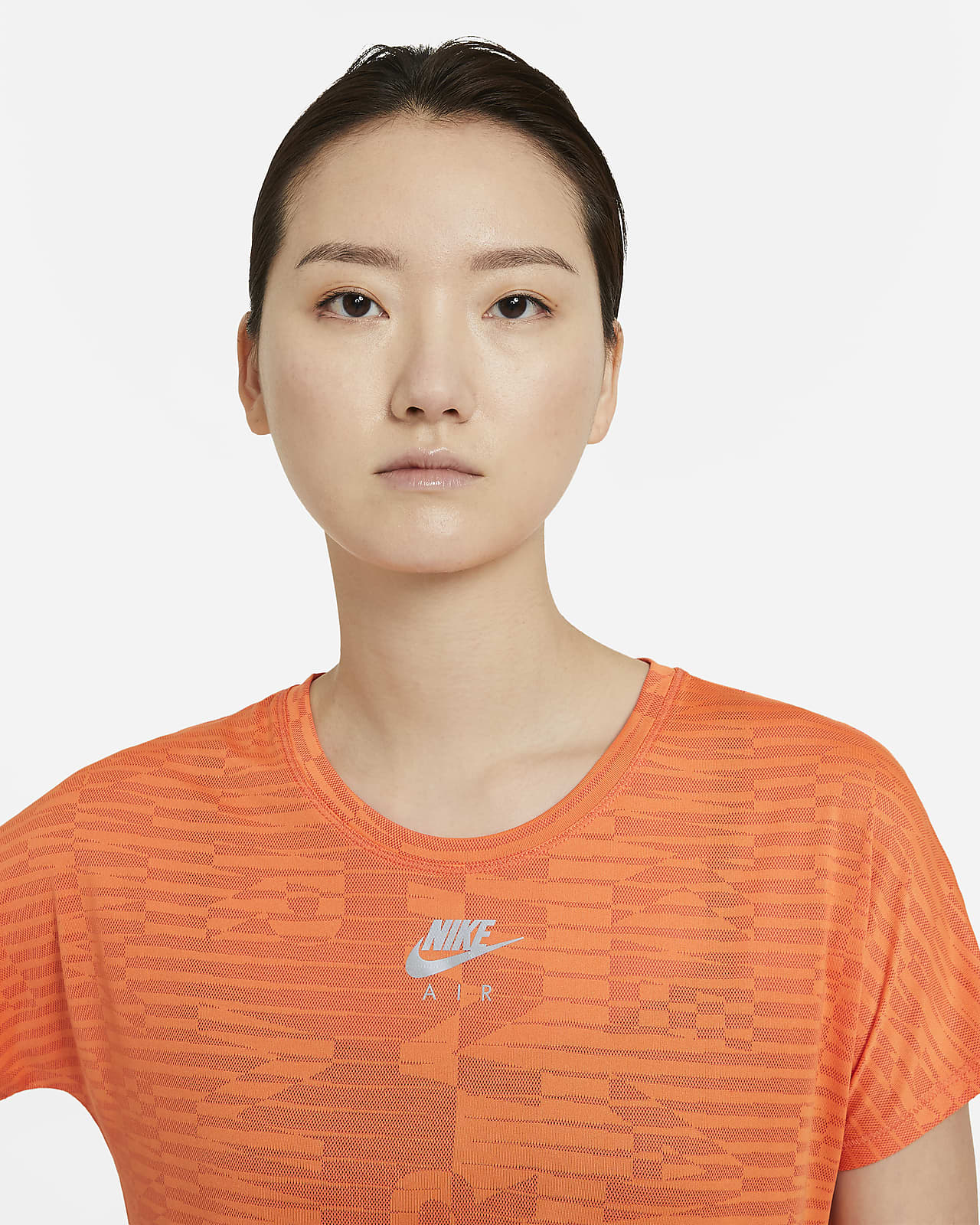 orange nike running top