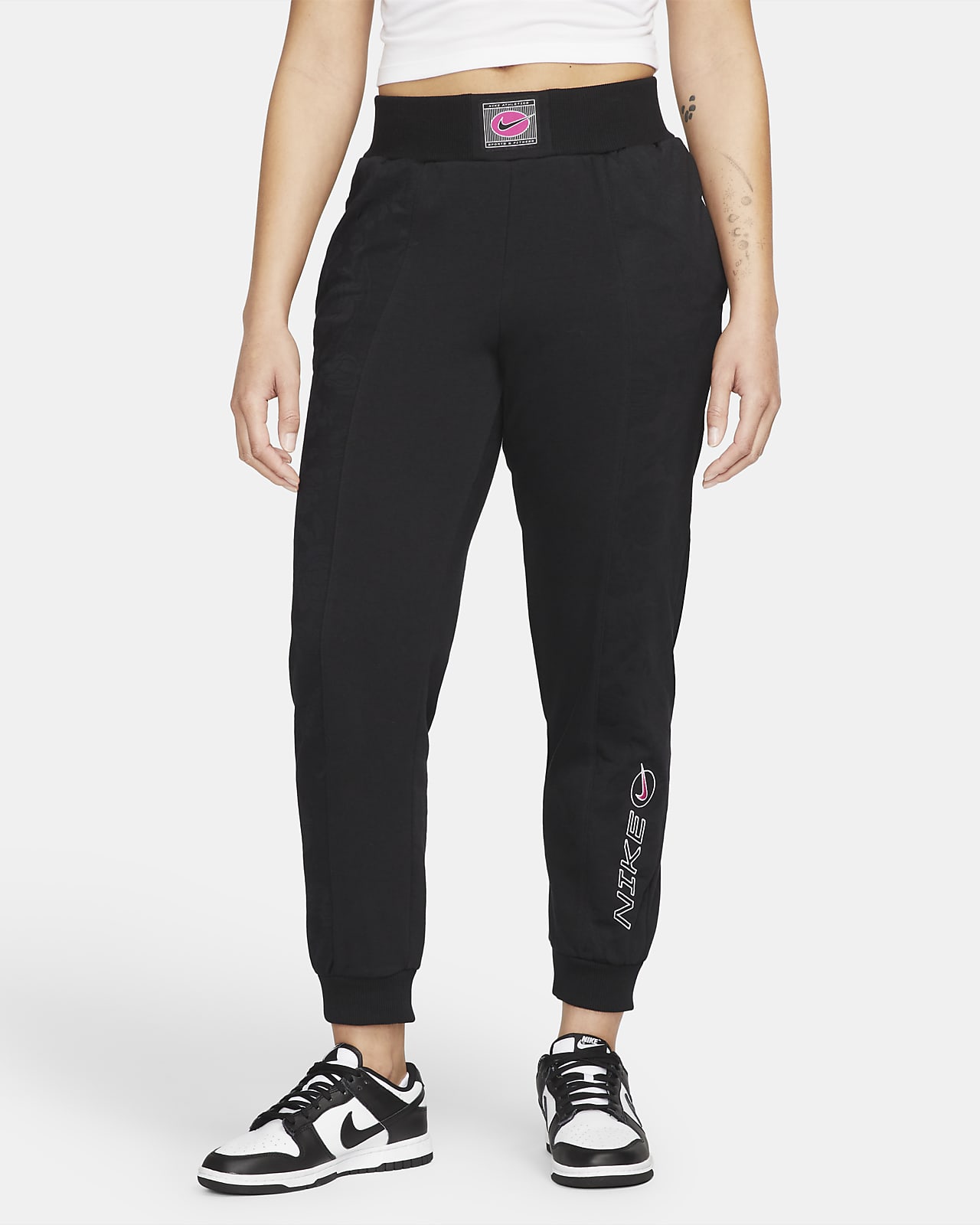 Pantalones de tejido Fleece de tiro medio para mujer Nike Sportswear Icon Clash