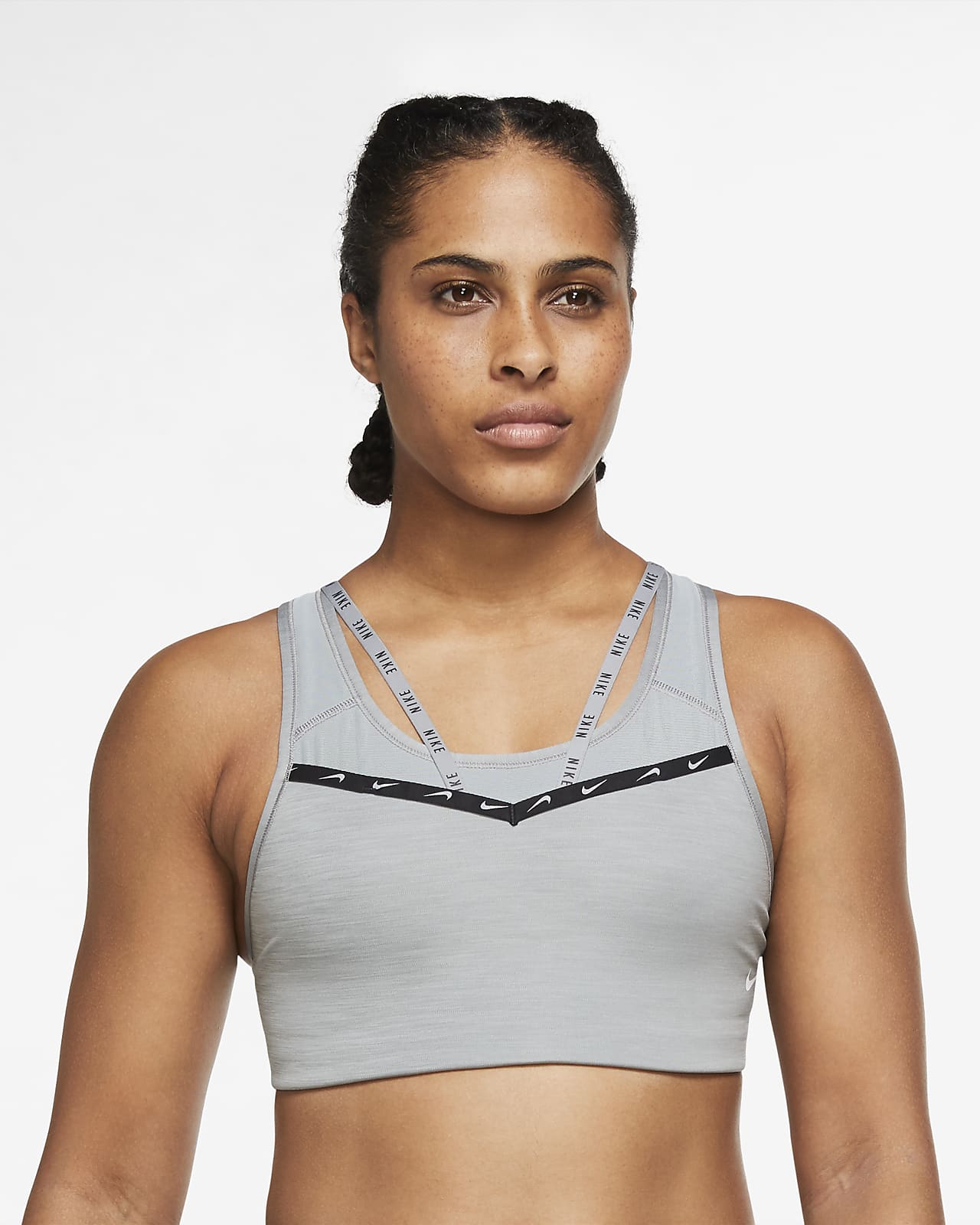Nike Dri-FIT Swoosh Sport-bh met medium ondersteuning, bandjes en een pad  uit één stuk. Nike BE