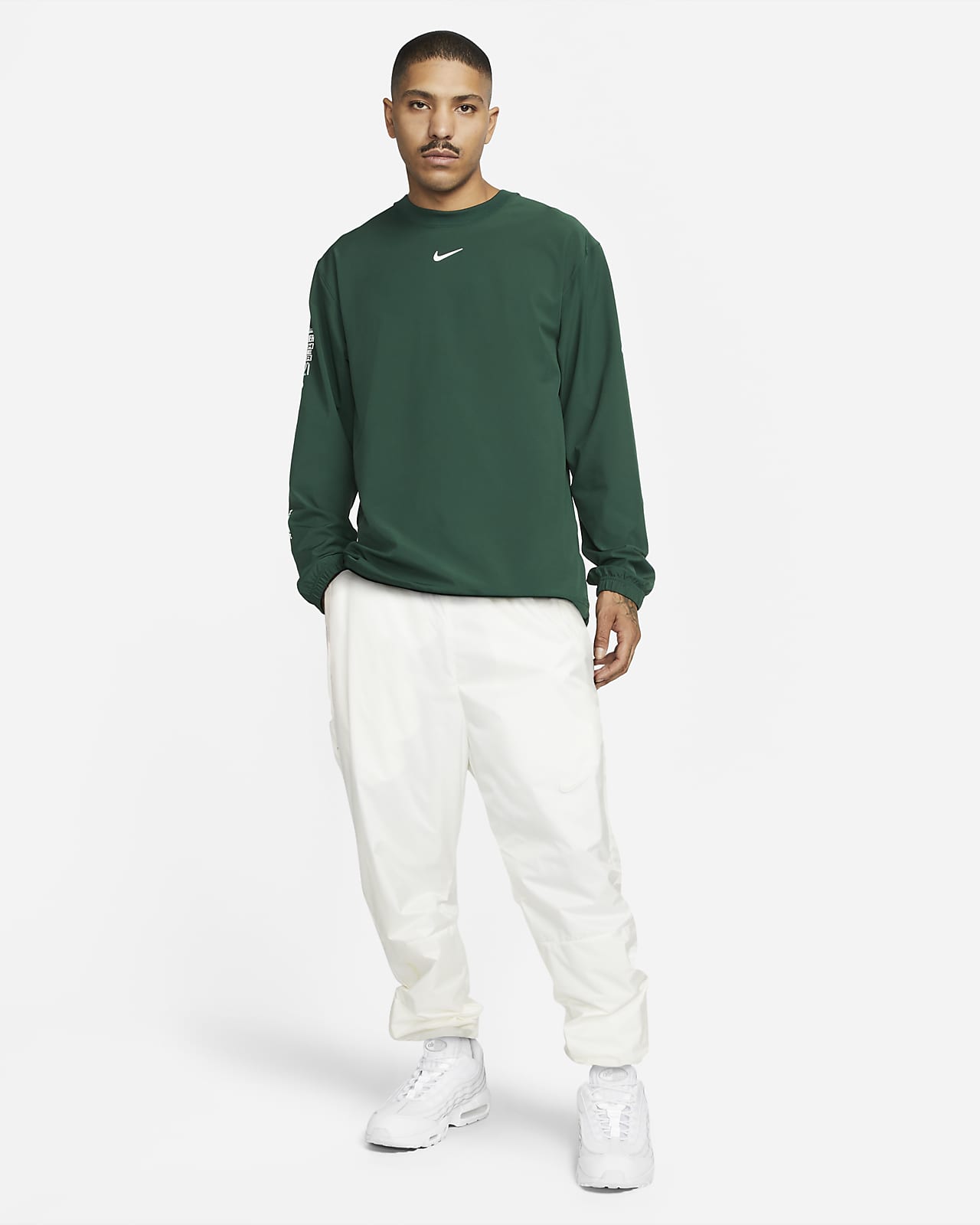 Sudadera de manga larga de tejido Woven para hombre NOCTA Golf. Nike.com