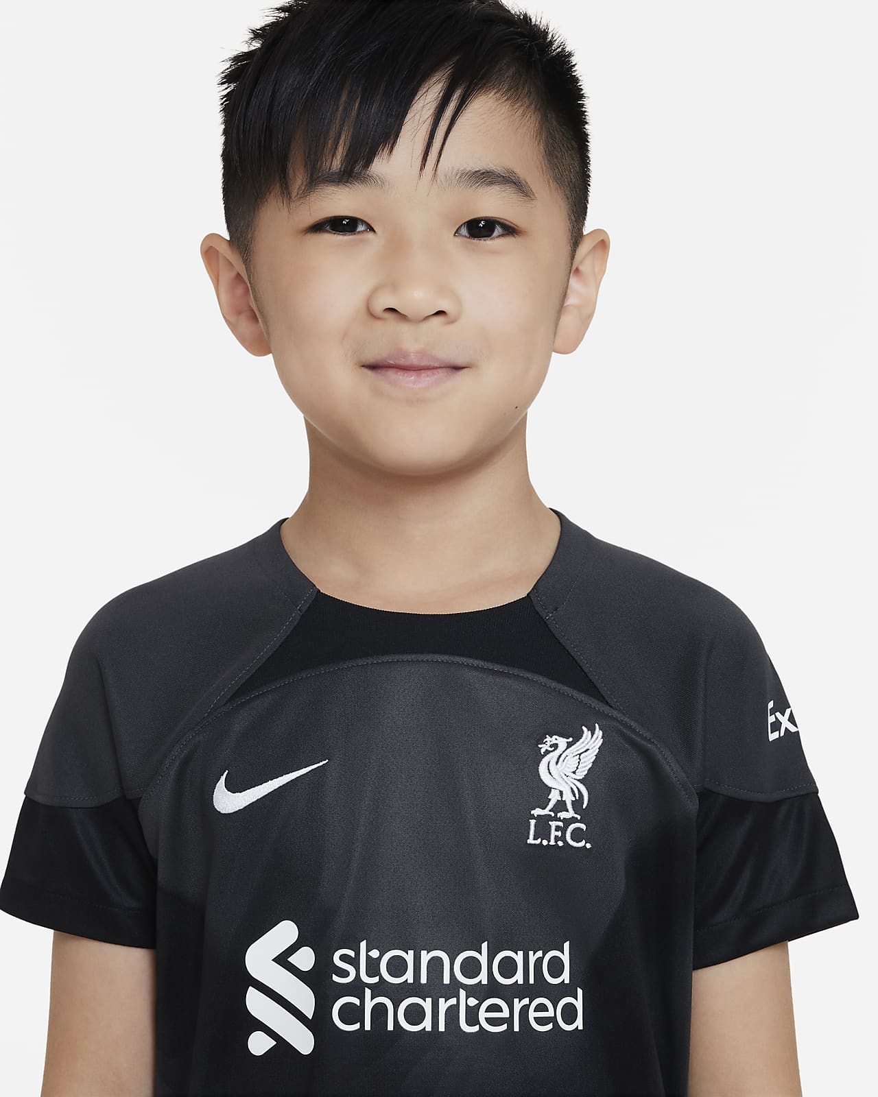 Liverpool F.C. 2022/23 Goalkeeper Younger Kids' Football Kit. Nike AE