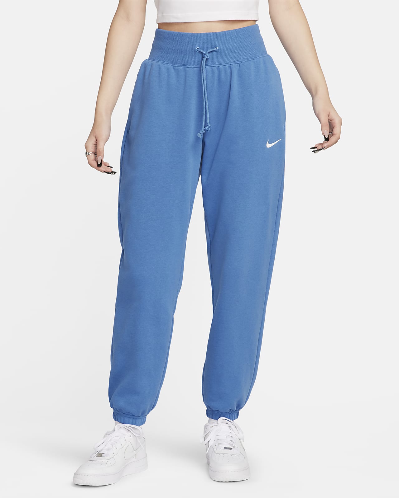 กางเกงซ้อมกีฬาผ้าเฟรนช์เทรีเอวสูงขนาดโอเวอร์ไซส์ผู้หญิง Nike Sportswear Phoenix Fleece