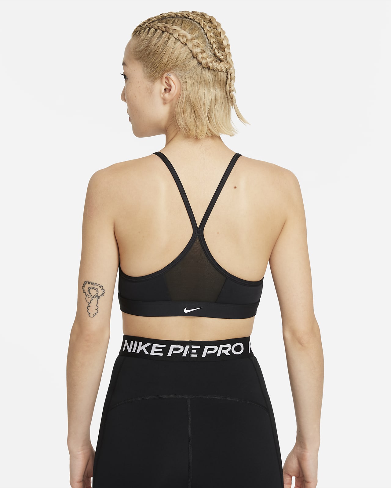 Nike Dri-FIT Indy Zip-Front 女款輕度支撐型襯墊運動內衣。Nike TW