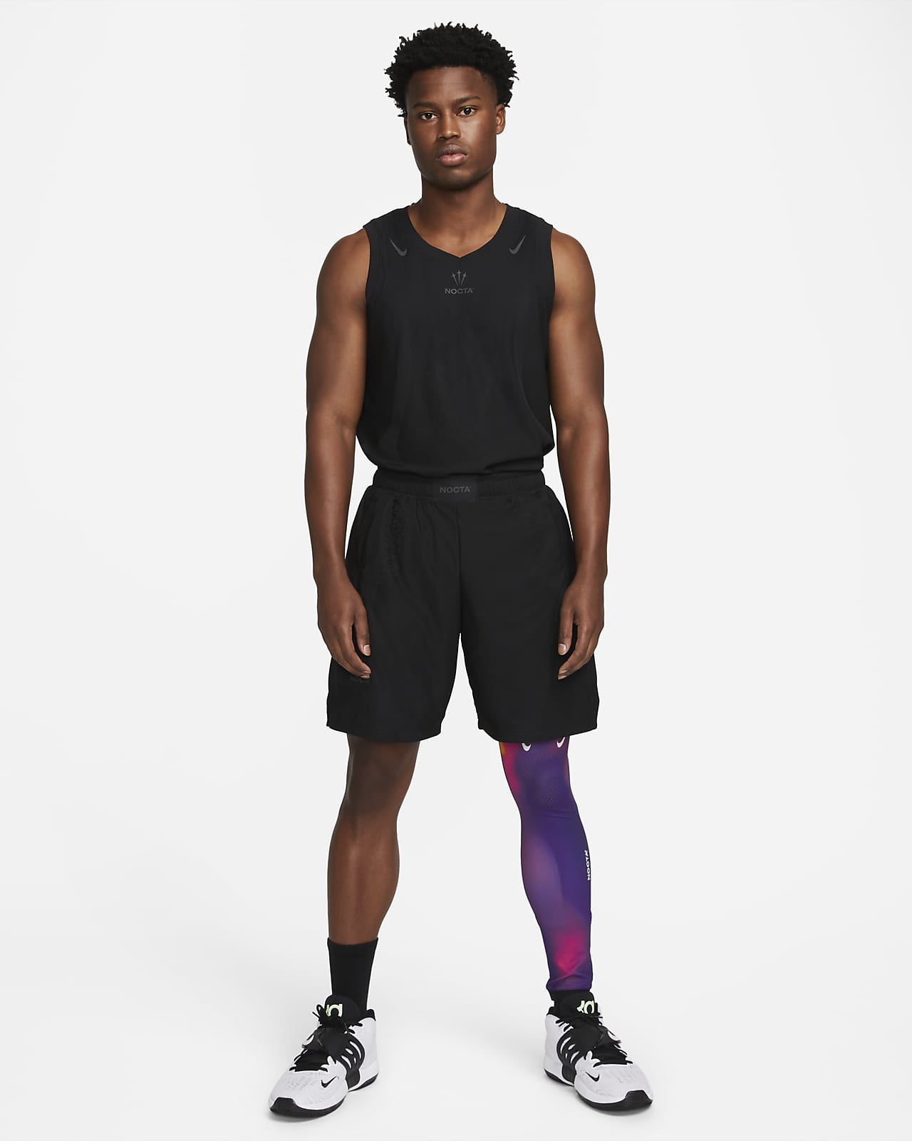 NOCTA Men's SingleLeg Printed Basketball Tights (Left). Nike SE