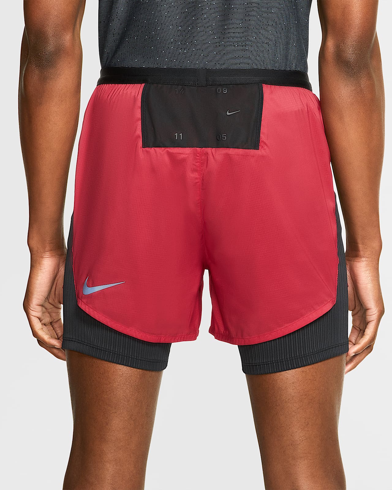 red nike tech shorts
