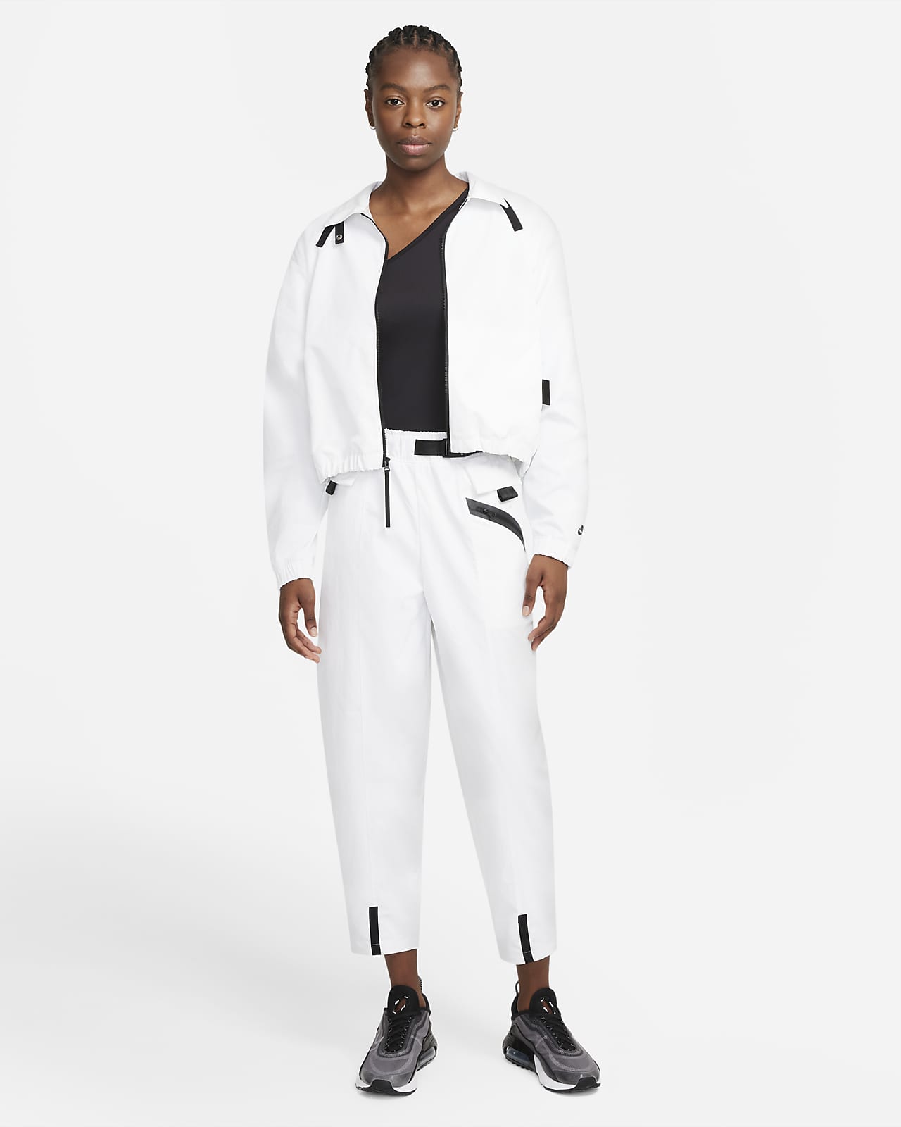 Pantaloni Curve in tessuto Nike Sportswear Tech Pack - Donna. Nike IT