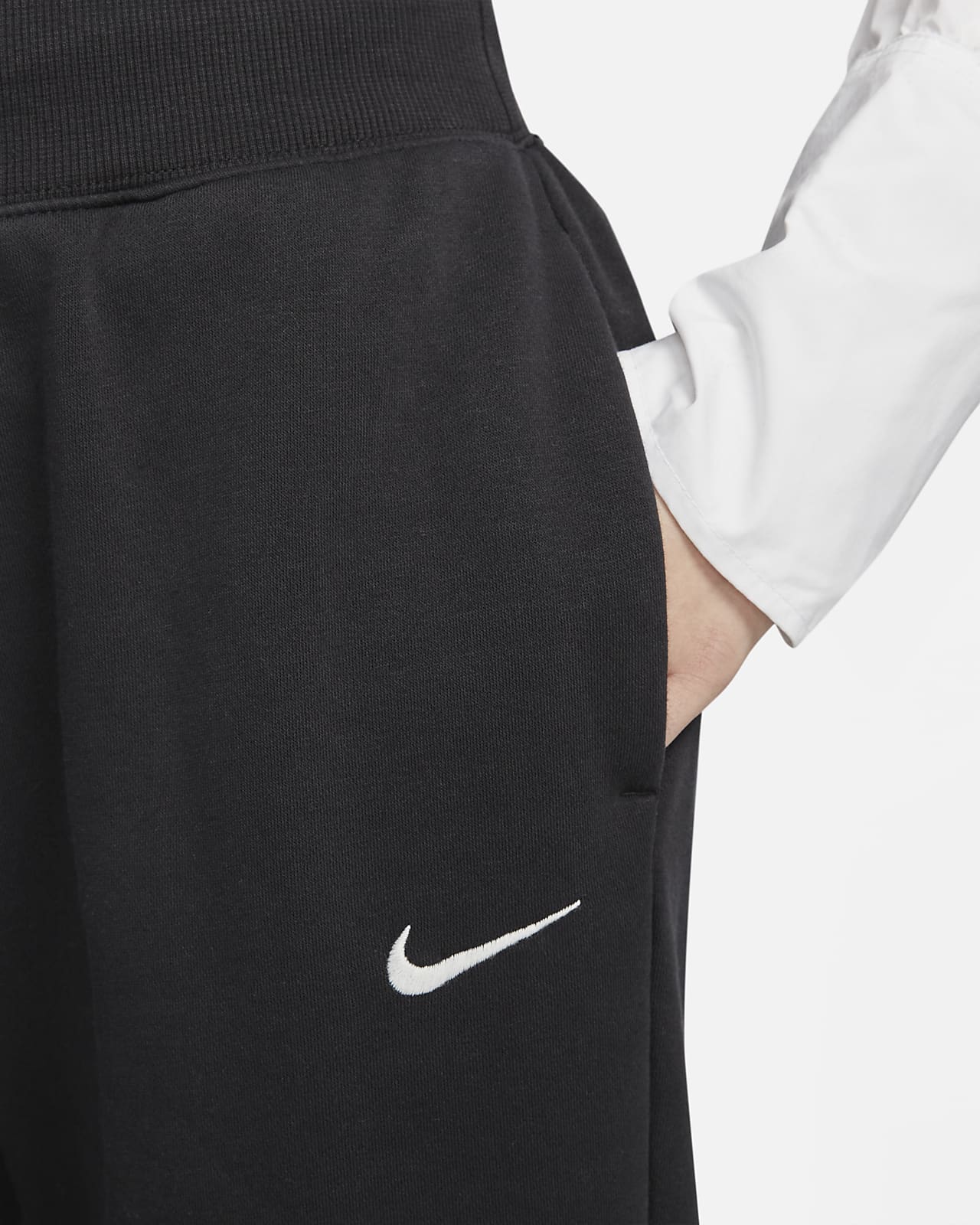 Nike Sportswear Women's High-Waisted Oversized Tracksuit Bottoms. Nike ID