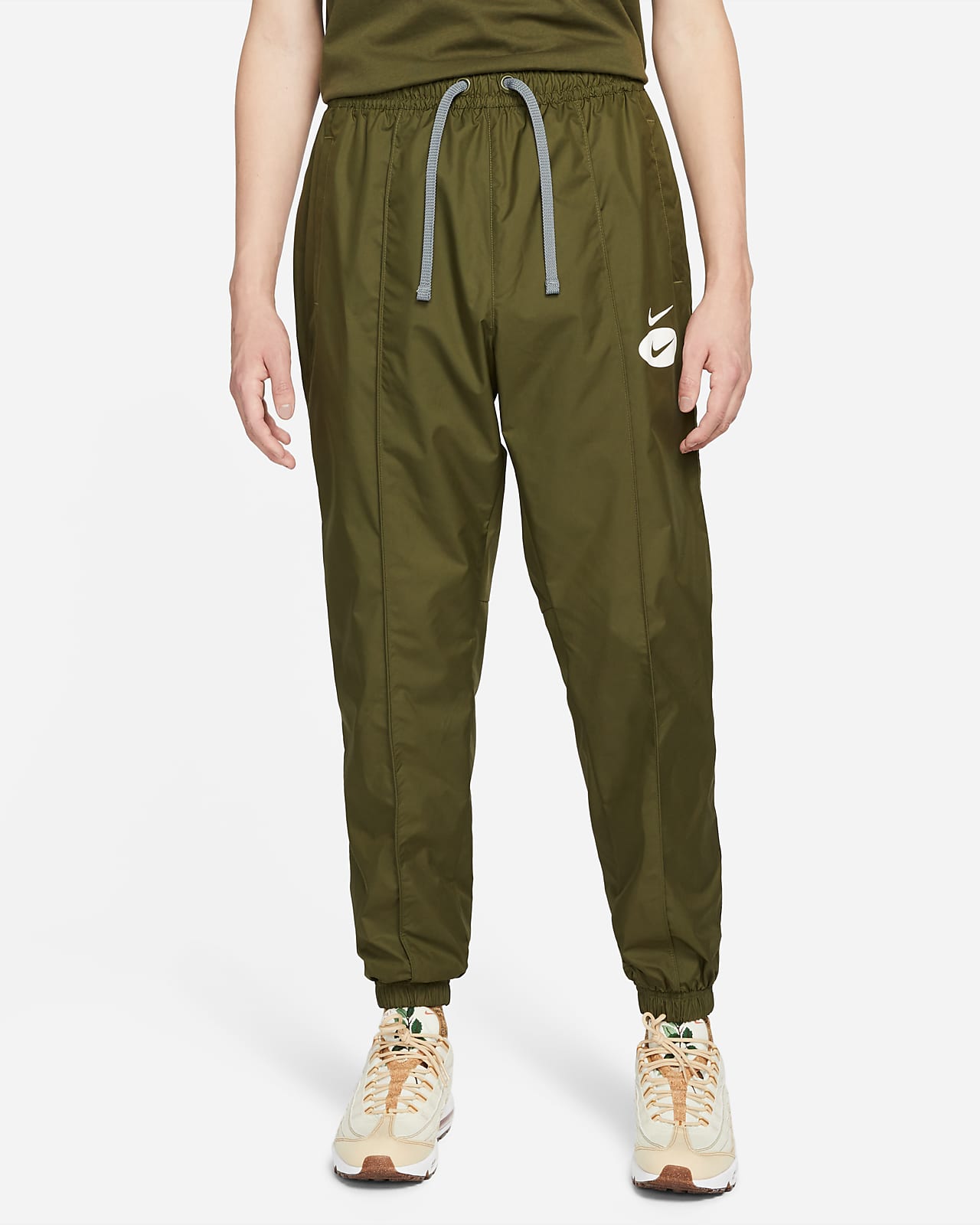 Pantaloni in tessuto con fodera Nike Sportswear Swoosh League - Uomo. Nike  CH