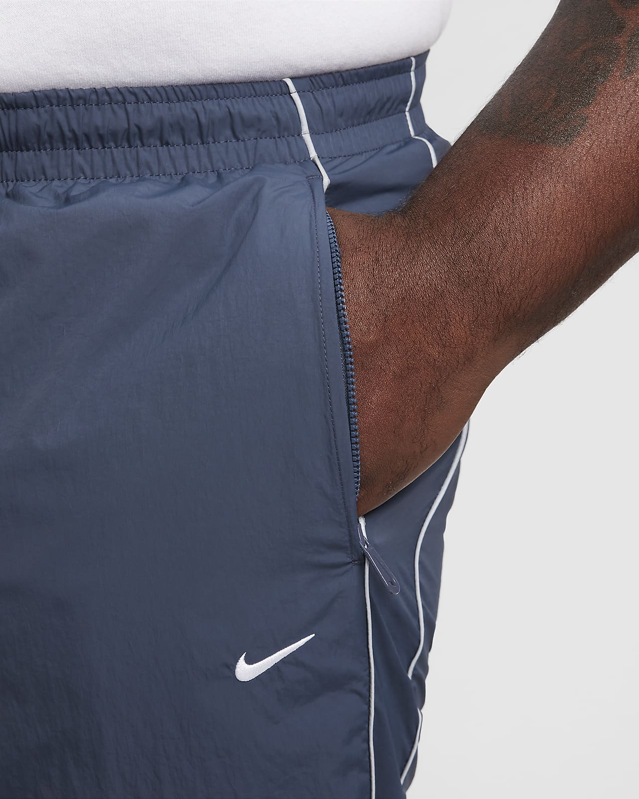 Nike Solo Swoosh Men's Track Pants.