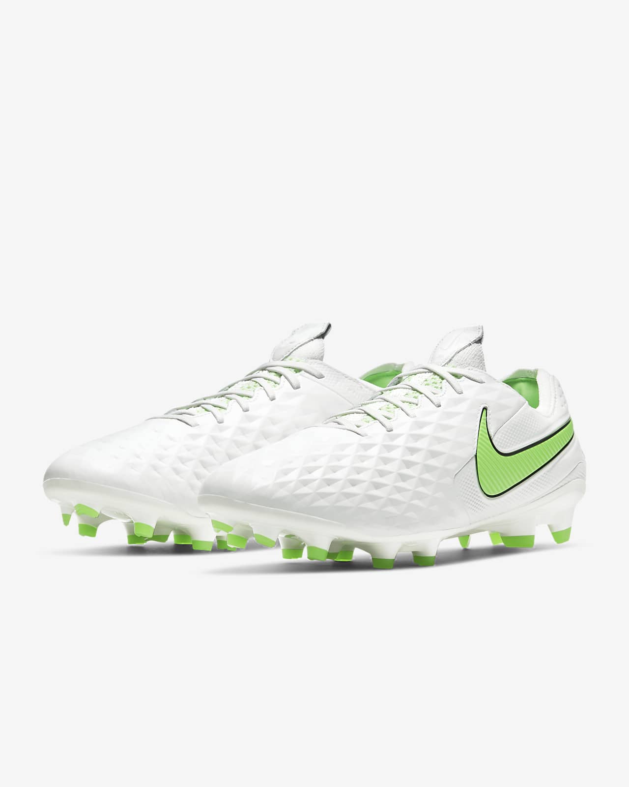 white and green nike football boots