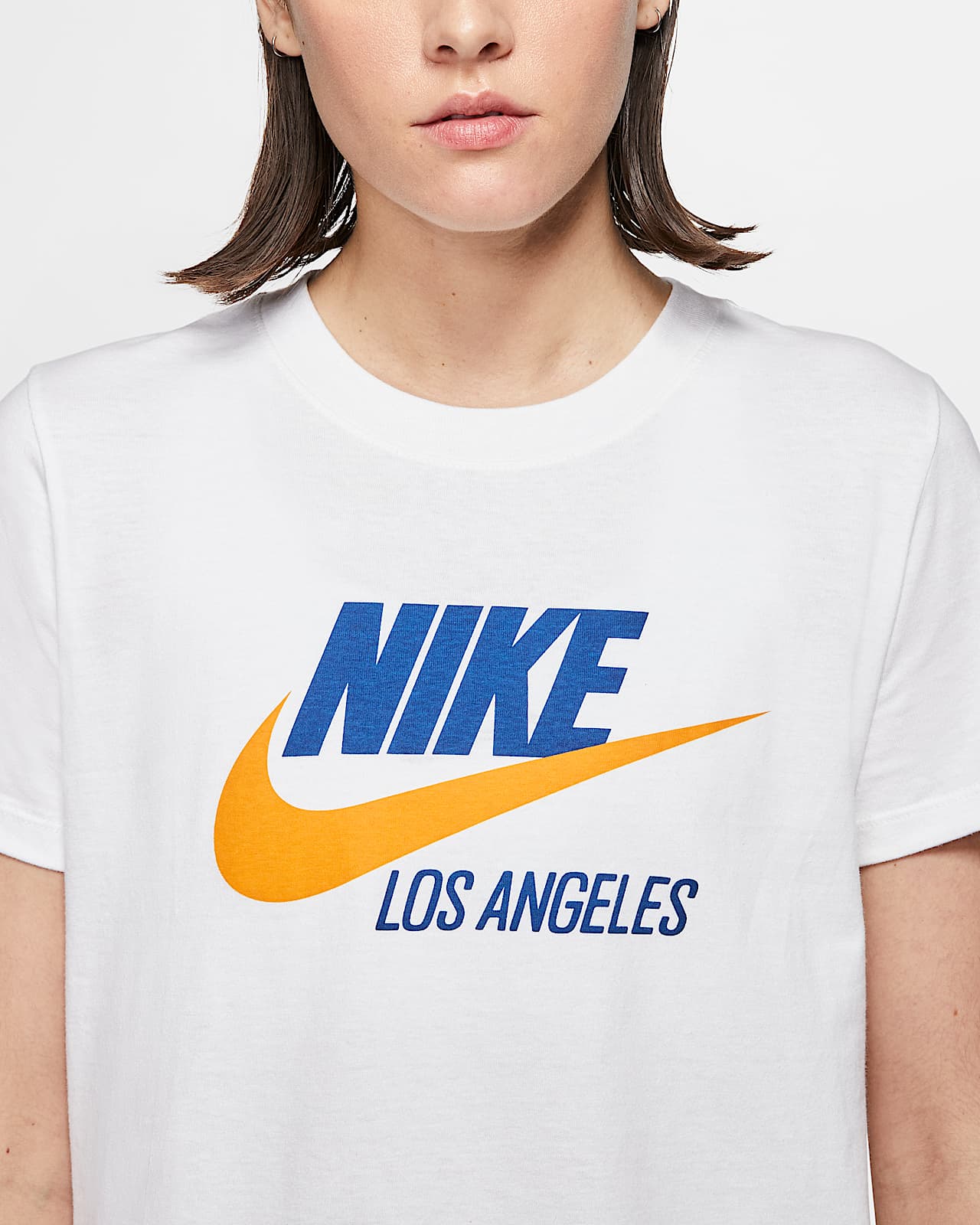 women's white and pink nike shirt