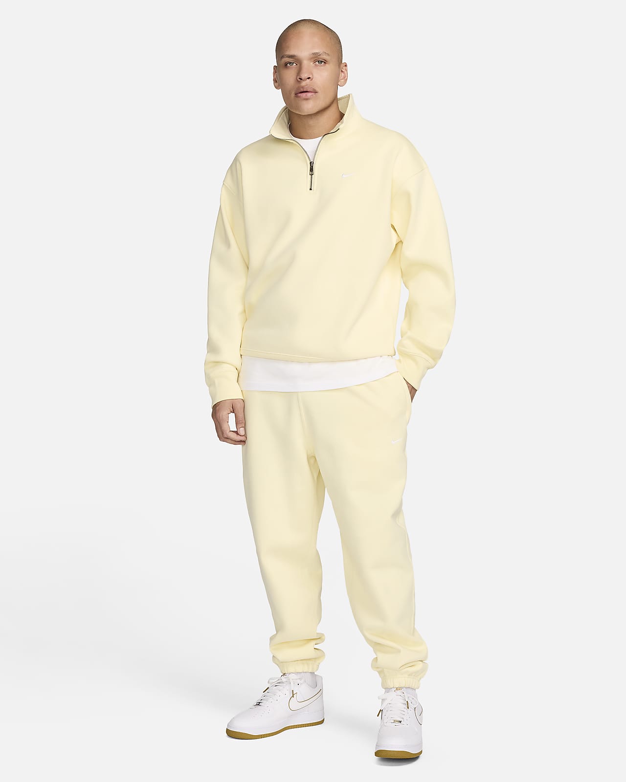 White Solo Swoosh Lounge Pants by Nike on Sale
