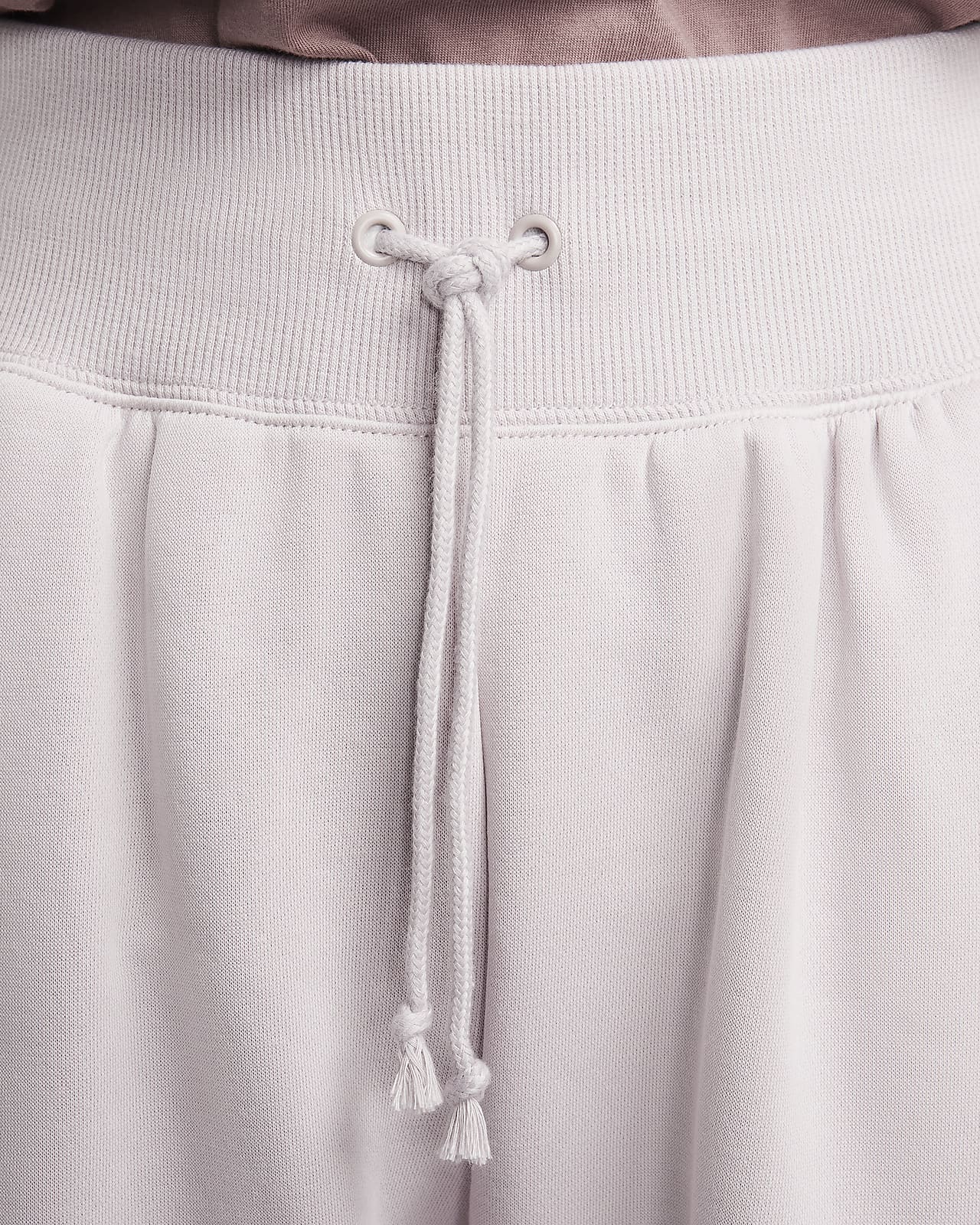 Pantaloni tuta oversize con logo Nike Sportswear Phoenix Fleece – Donna.  Nike CH
