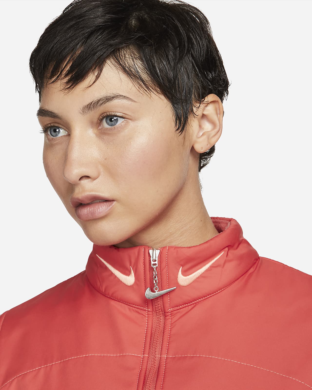 swoosh zip top