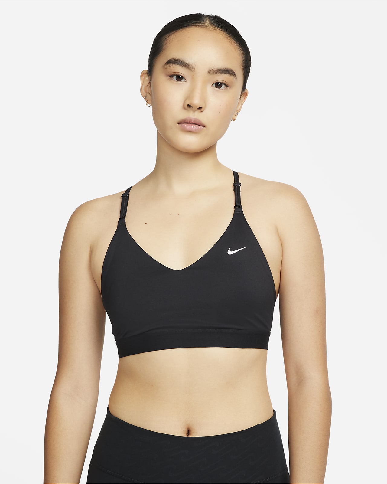 Nike Indy Niet-gewatteerde sport-bh met lichte ondersteuning. Nike NL