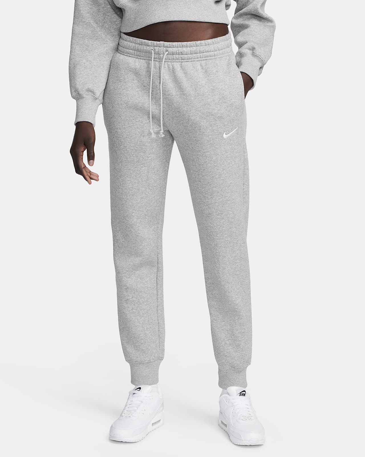 Damskie spodnie dresowe ze średnim stanem Nike Sportswear Phoenix Fleece