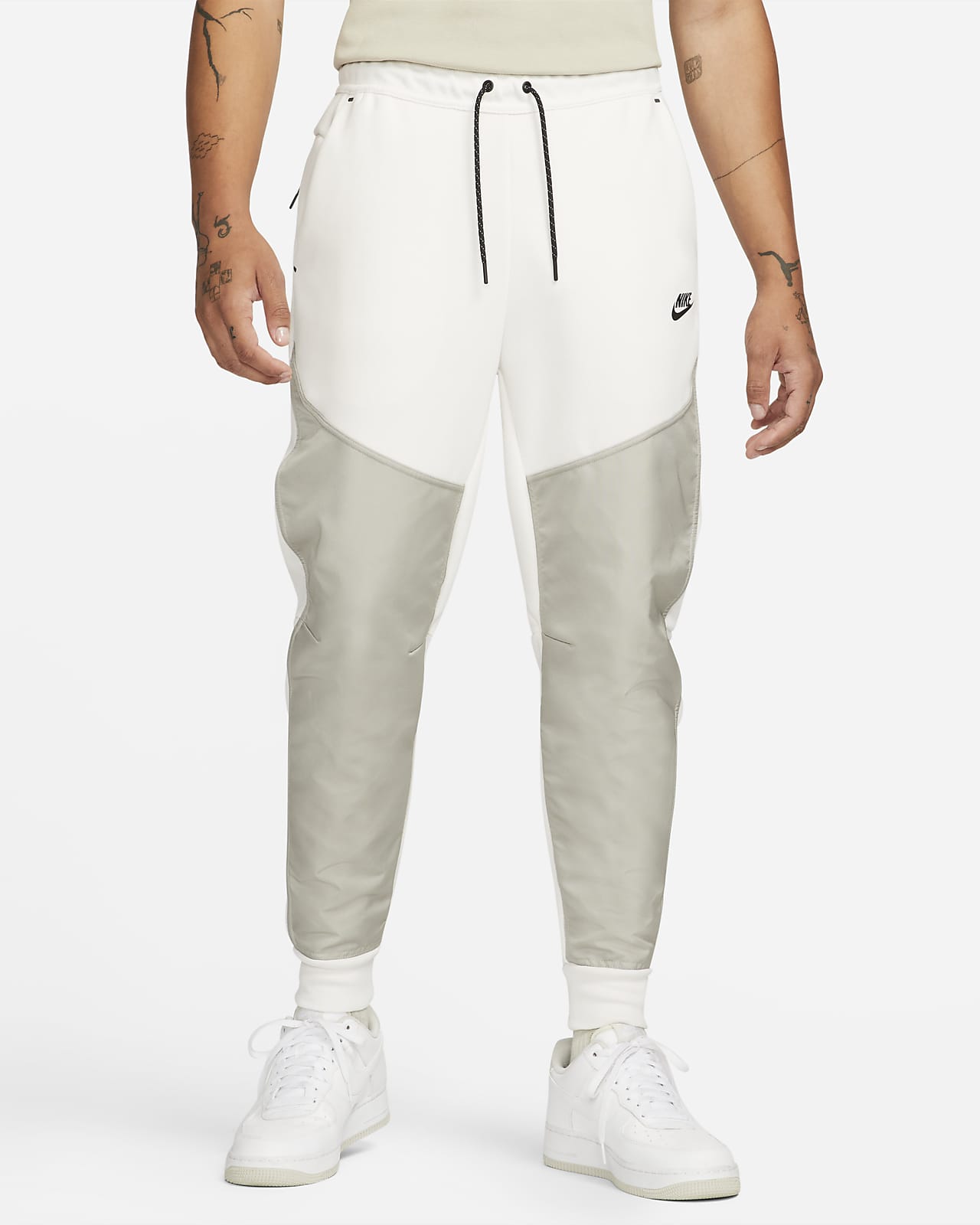 nike tech tapered pants