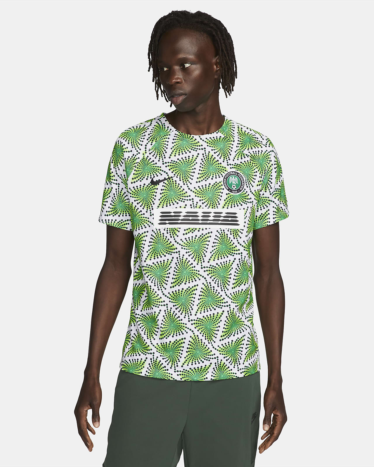 Playera fútbol antes del partido Nike para hombre Nigeria. Nike.com