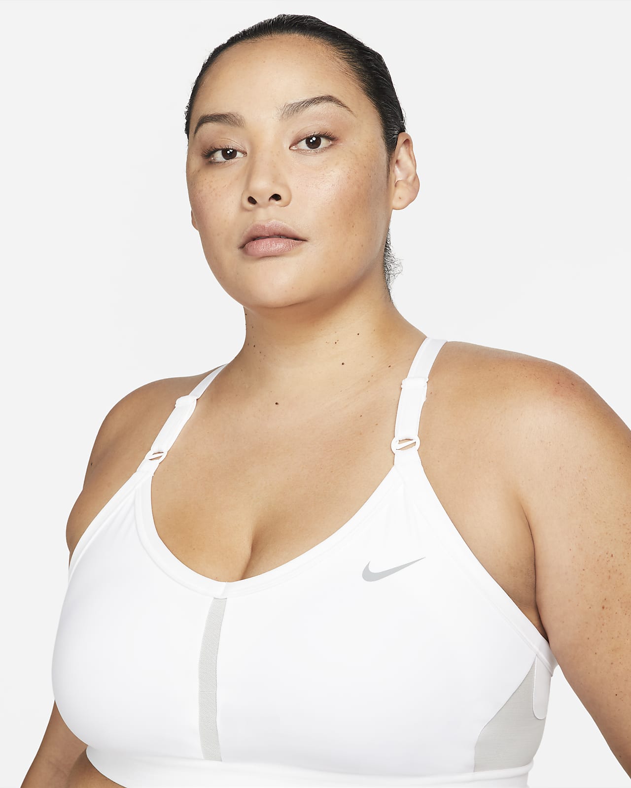 Sutiã de desporto almofadado de suporte ligeiro com decote em V Nike Indy  para mulher (tamanhos grandes)