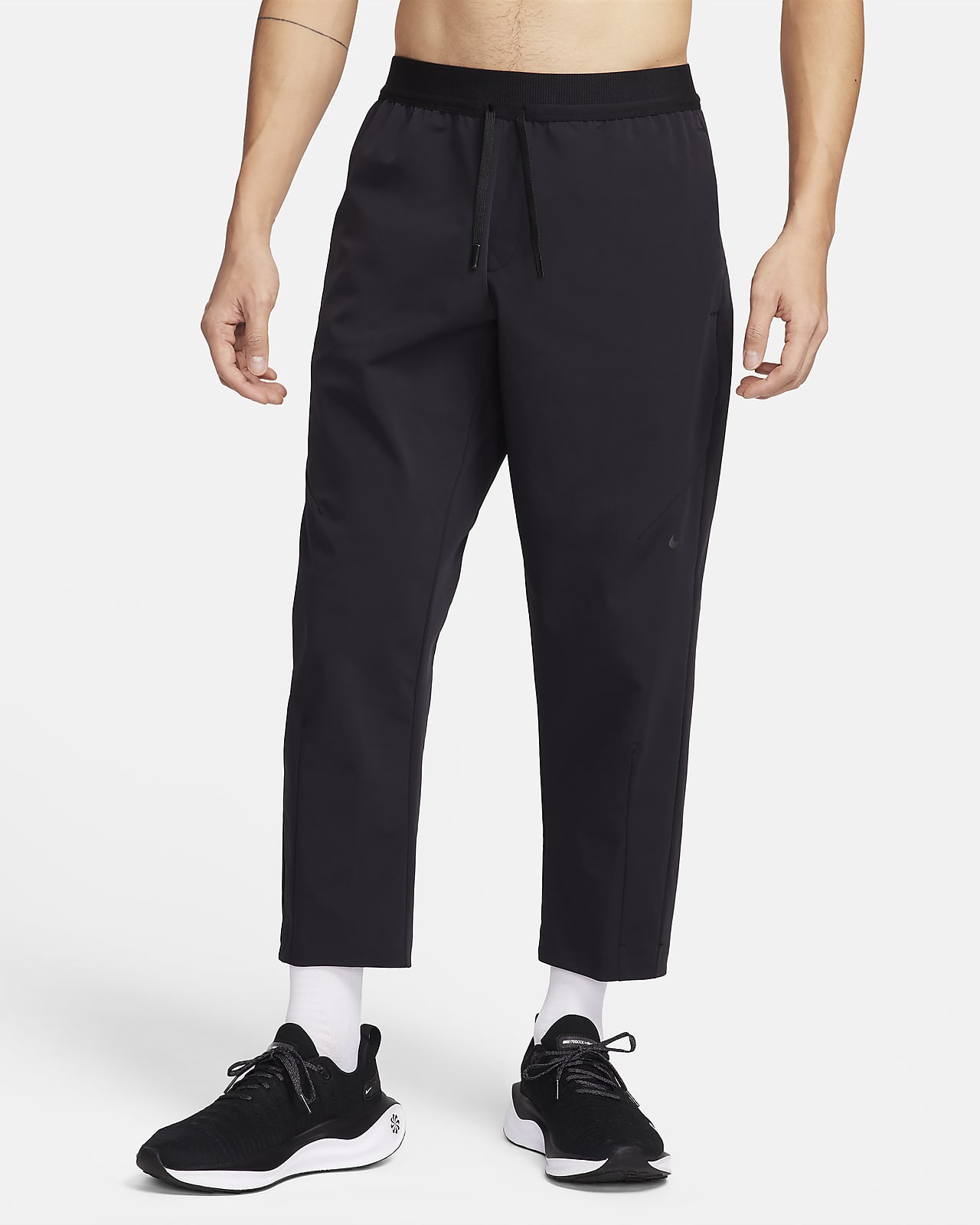 Nike A.P.S. Pantaloni versatili in tessuto Dri-FIT – Uomo