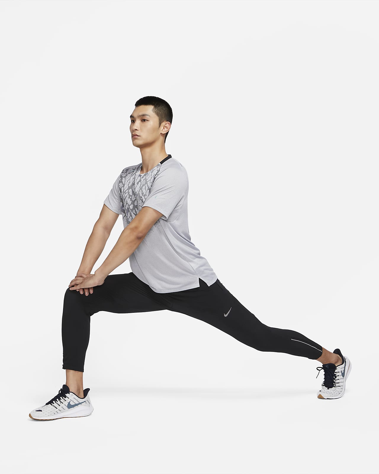 Nike Dri-FIT Phenom Elite 男款梭織跑步長褲。Nike TW