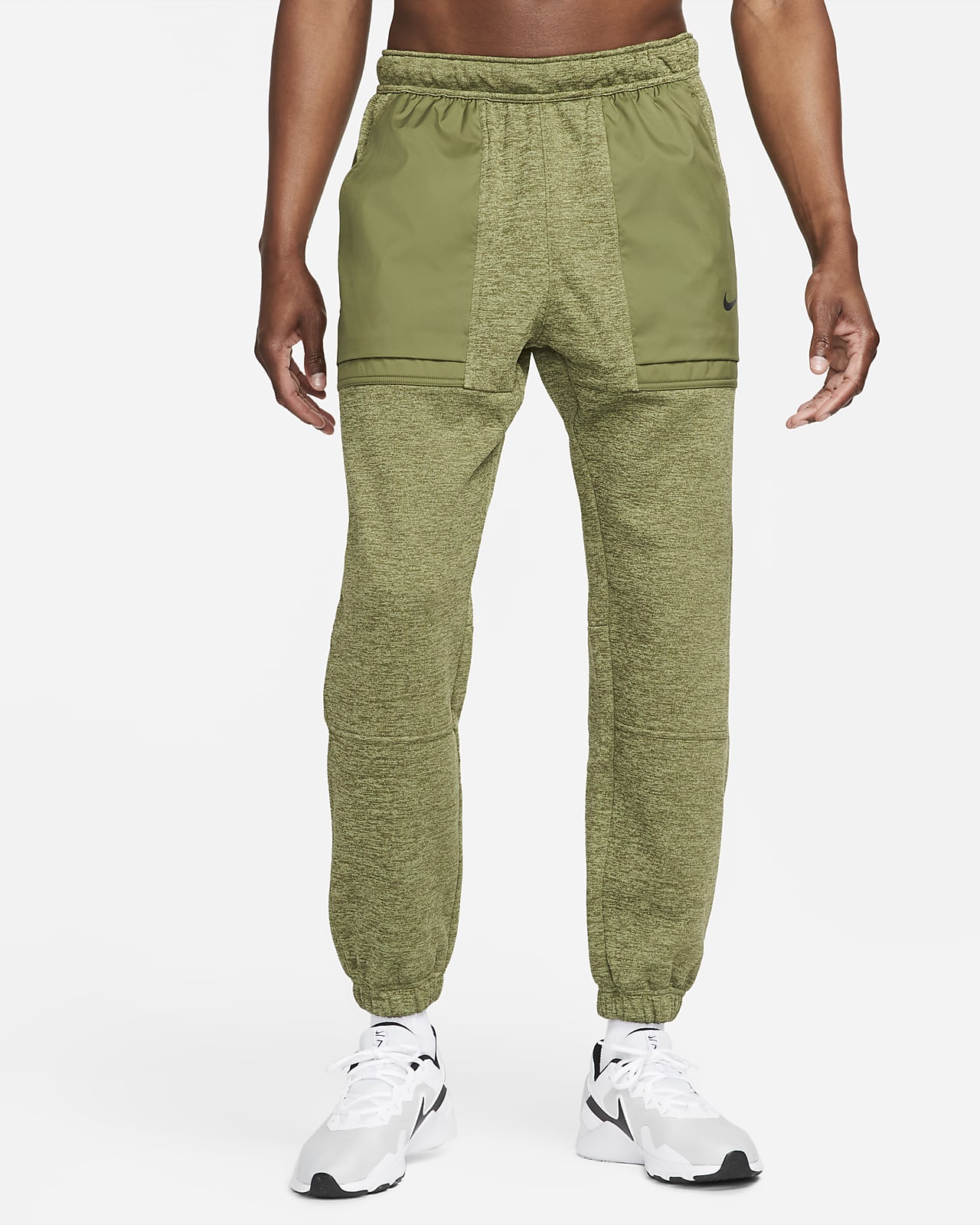 Nike Therma-FIT Fitnessbroek met taps toelopend design voor heren. Nike BE