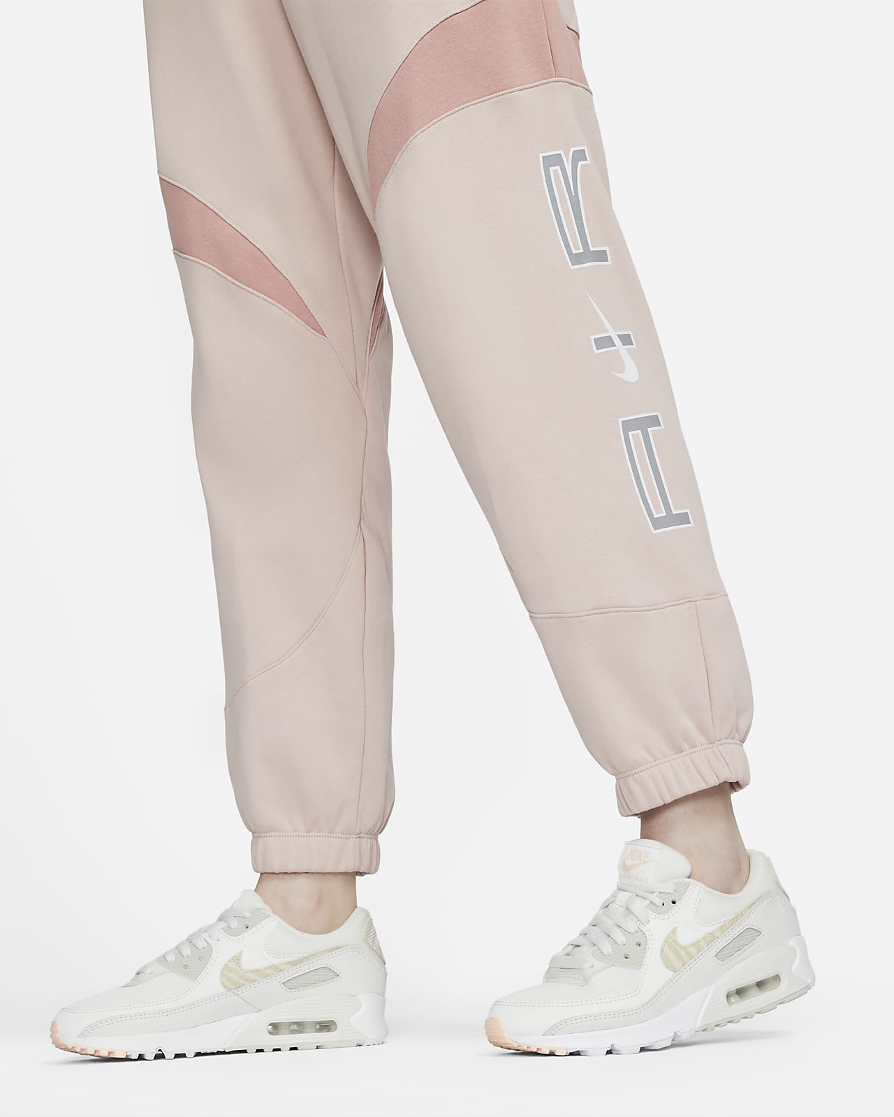 nike women's sportswear tracksuit joggers rust pink
