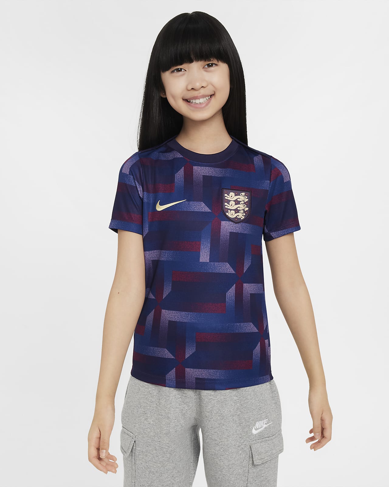 England Academy Pro Nike Dri-FIT Pre-Match-fodboldtrøje med korte ærmer til større børn