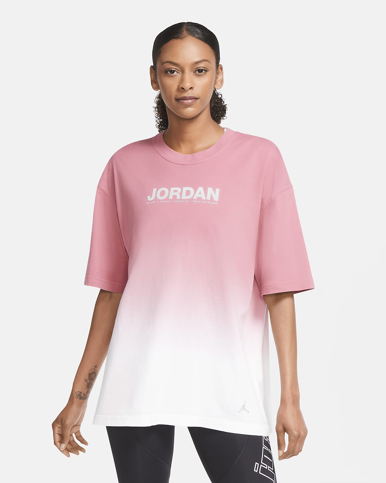 white and pink jordan shirt