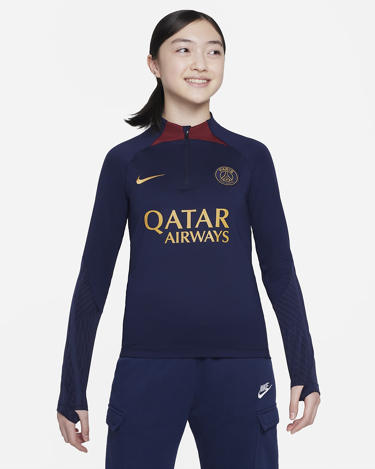 Fotbalové pleteninové tréninkové tričko Nike Dri-FIT Paris Saint-Germain Strike pro větší děti