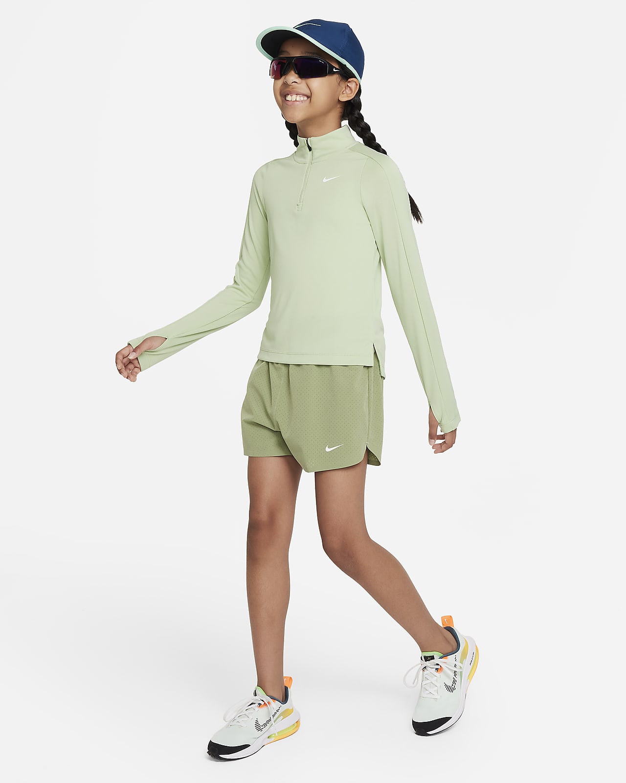 Nike Dri-FIT Older Kids' (Girls') Long-Sleeve 1/2-Zip Top. Nike SE