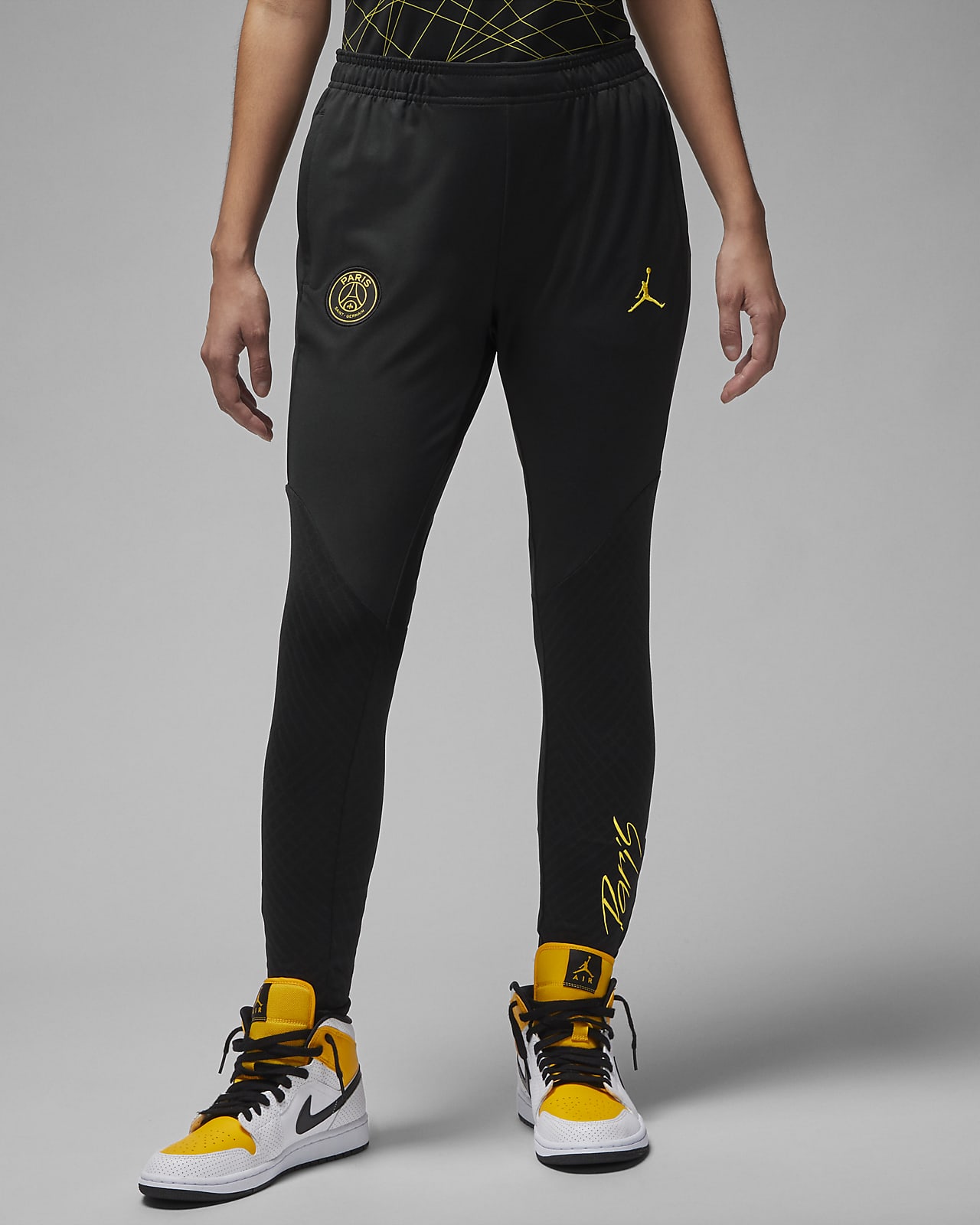 black and yellow jordan pants