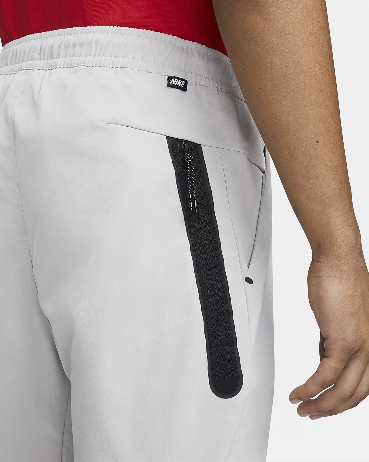 Nike Sportswear Tech Essentials Men's Unlined Commuter Trousers. Nike PT