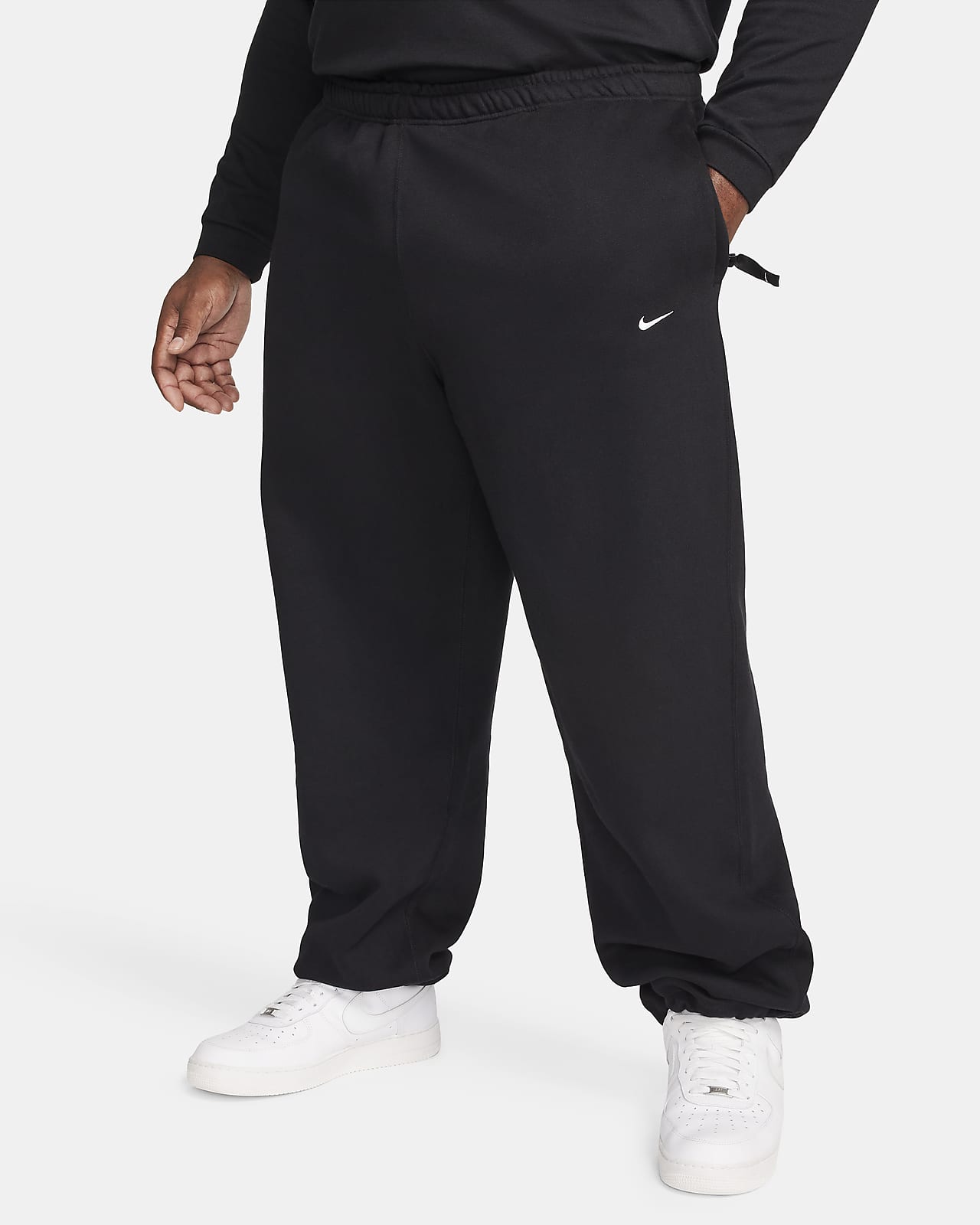 Black Solo Swoosh Lounge Pants by Nike on Sale