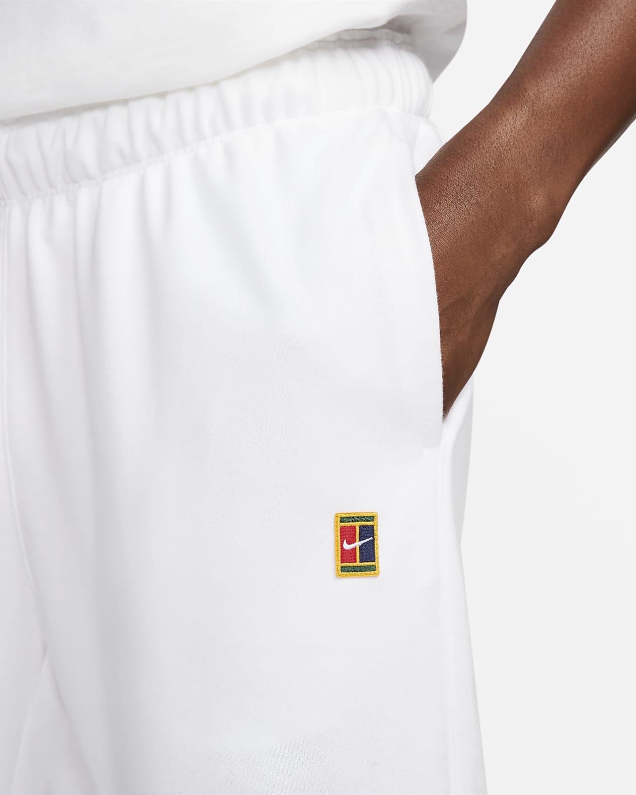Pantaloni da tennis in French Terry NikeCourt Heritage Uomo. Nike CH