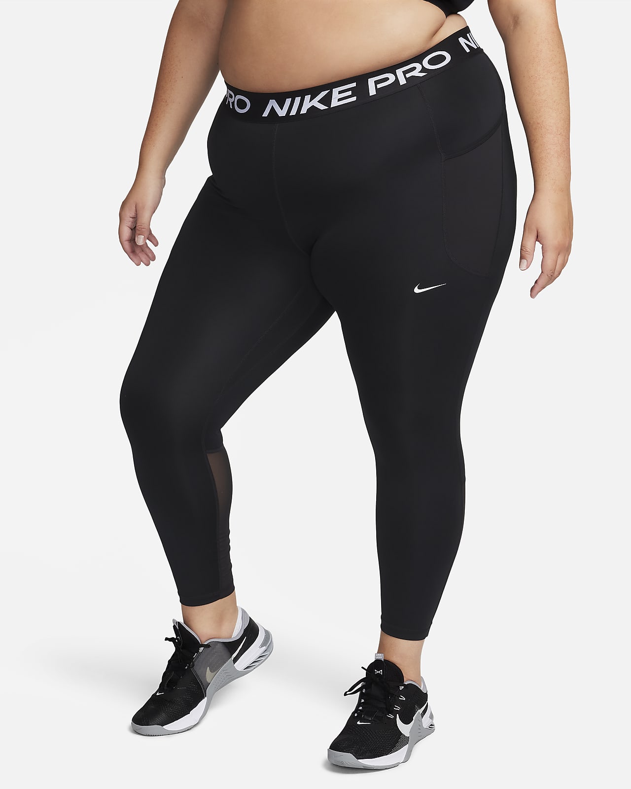 Leggings estampados con bolsillos de 7/8 y tiro medio para mujer (talla  grande) Nike Fast.