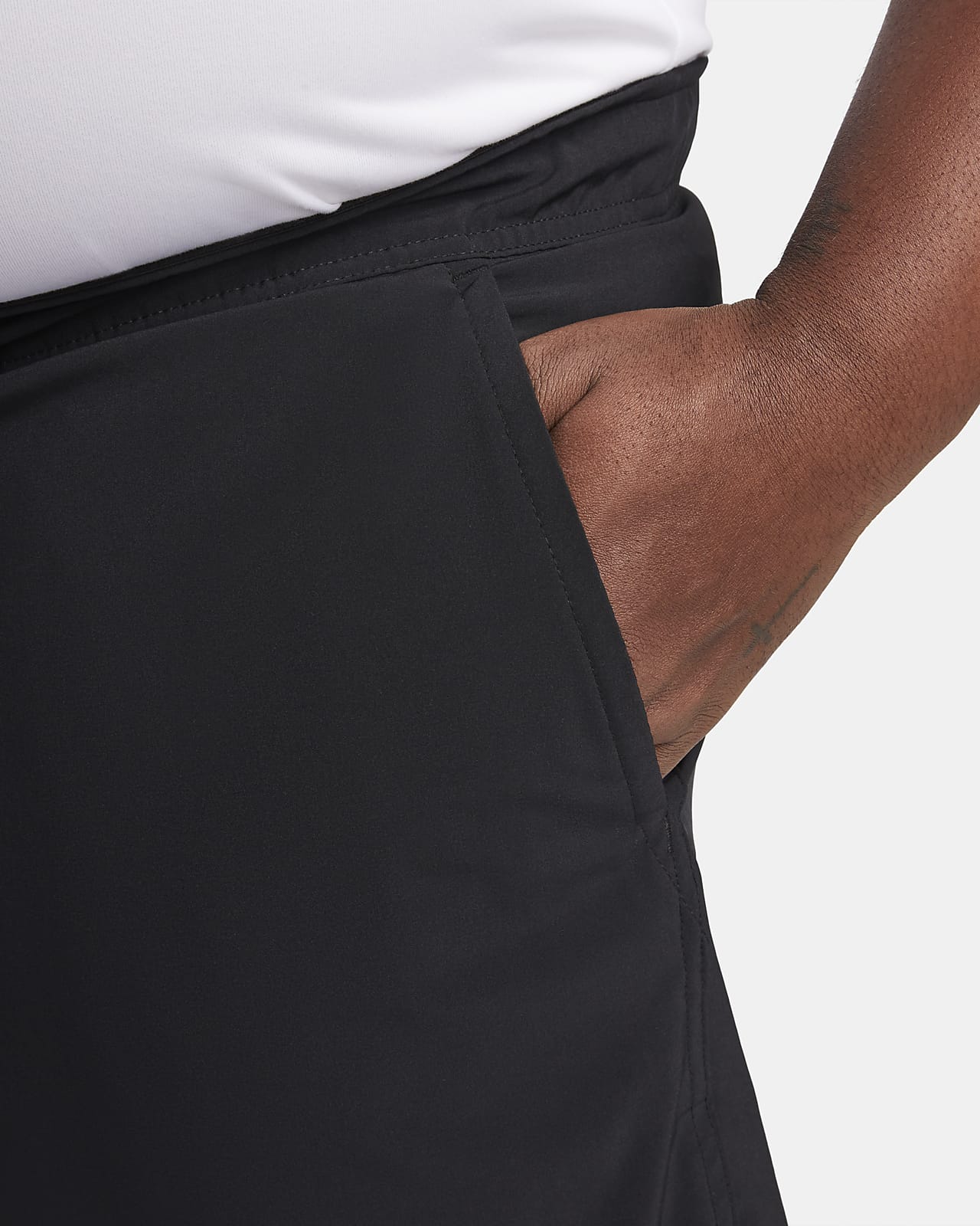 Nike Unlimited Pantalón corto Dri-FIT versátil de 18 cm sin forro