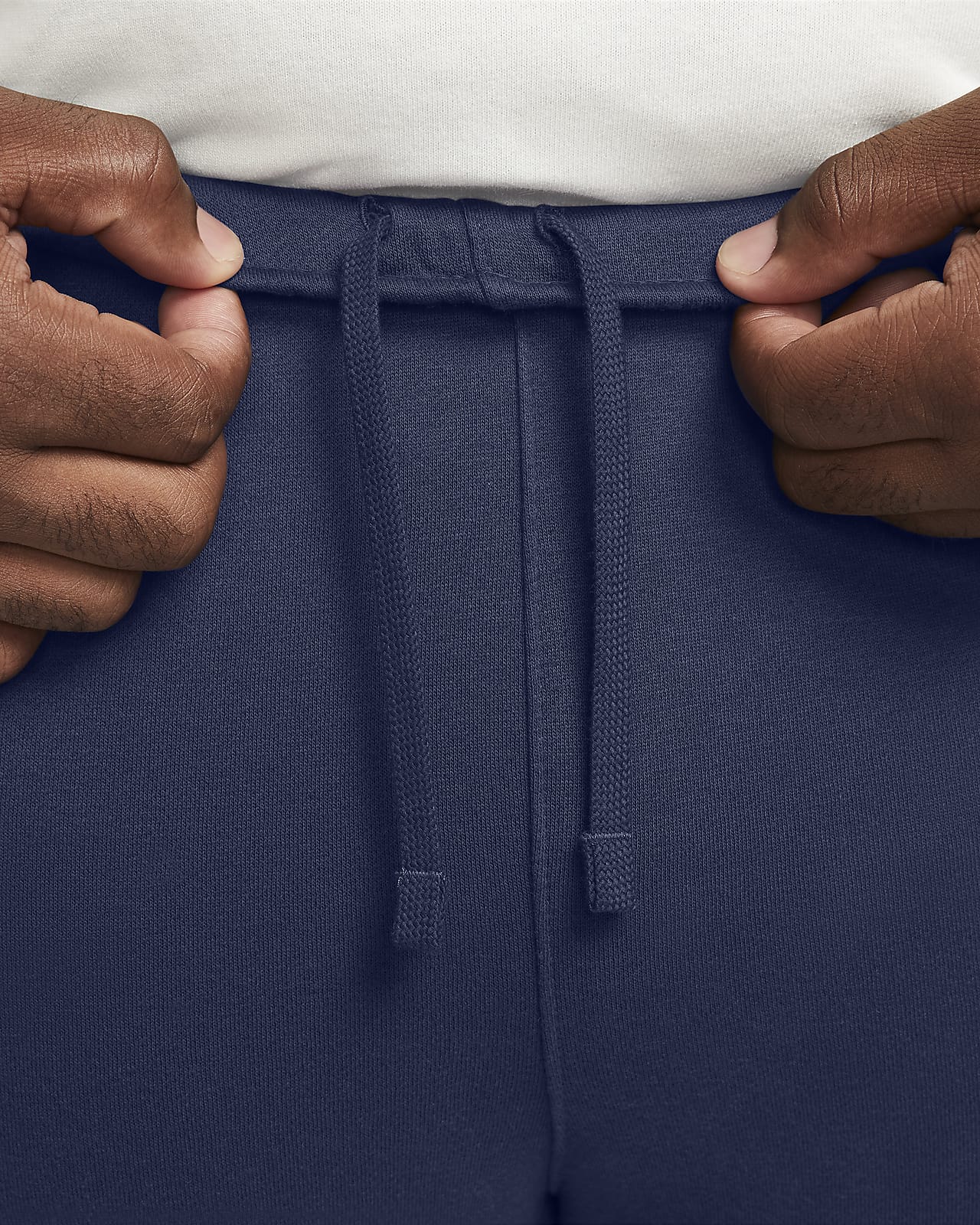 Nike Sportswear Tapered Trousers in Cream